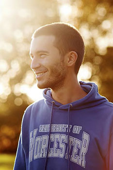 Smiling student wearing a University of Worcester hoody